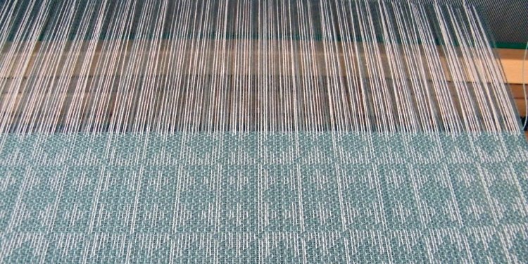 Dust Bunnies Under My Loom: