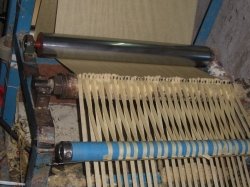 Cutting Straw Colored Tissue Paper into Strips Cutting Straw Colored Tissue Paper into Strips