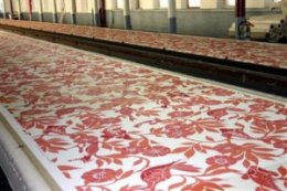 Fabric is hand silk screened for decorative and boutique furnishings design market