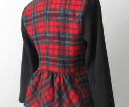 Red plaid jacket with black sleeves