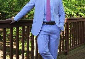 seersucker suit with pink tie